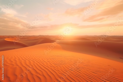 Sunset over the desert of Al Khatim in Abu Dhabi Emirates. Golden Sand Dune Desert Landscape Panorama. Beautiful sunset over the sand dunes in the Al Khatim in Abu Dhabi Emirates photo