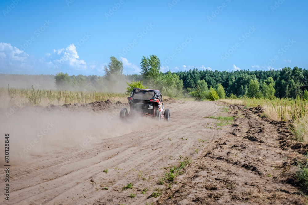 Naklejka premium Cool view on hard ride UTV, ATV, 4x4 in sandy road