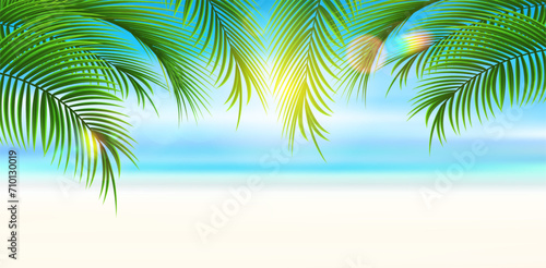 Tropical beach with palm leaves. Summer landscape of tropical island. Vacation and travel.