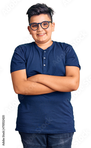 Little boy kid wearing casual clothes and glasses happy face smiling with crossed arms looking at the camera. positive person.