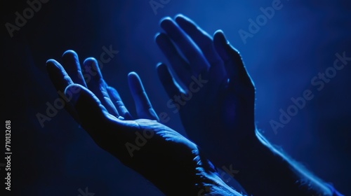 A pair of hands reaching up into the air. Can be used to symbolize hope, success, or reaching for goals