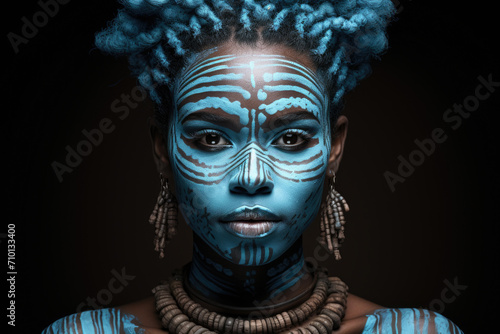 Woman with blue paint on her face. Suitable for artistic projects or Halloween-themed designs.
