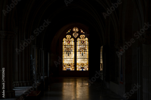 Stained glass window in an interior hallway of the Cathedral of Burgos  Castilla y Le  n  Spain.