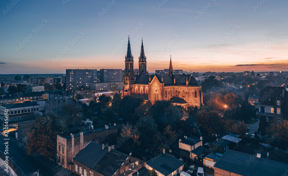 View at Pabianice city and Church of Our Lady of the Rosary from a drone at sunset