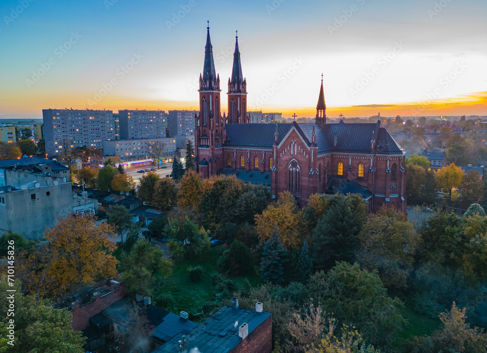 View at Pabianice city and Church of Our Lady of the Rosary from a drone at sunset View at Pabianice city and Church of Our Lady of the Rosary from a drone at sunset