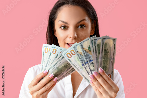 Young woman with dollar ban...