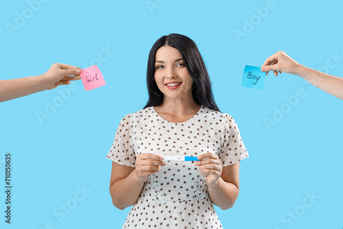 Happy young woman with preg...