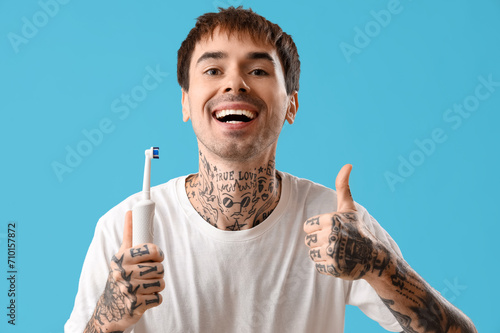 Young tattooed man with too...
