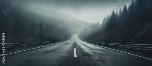 Blurred image of a road on a gloomy day.