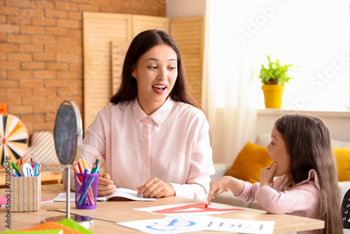 Female Asian speech therapi...