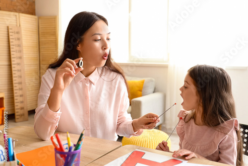 Female Asian speech therapi...