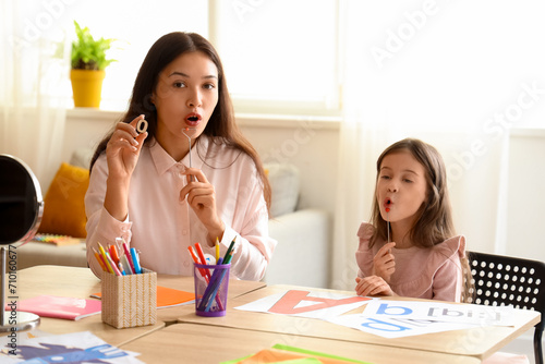 Female Asian speech therapi...