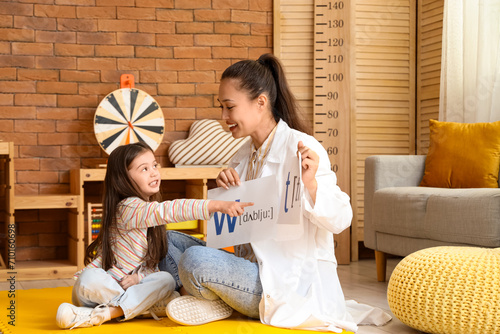 Female Asian speech therapi...
