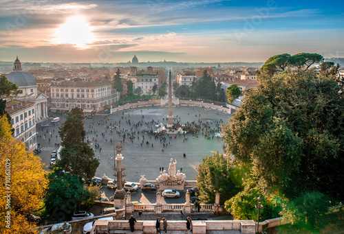 Piazza del Popolo in the evening, seen from Terrazza del Pincio, with the Vatican Dome hardly seen in the background. Scenic sunset in Rome, Italy. photo