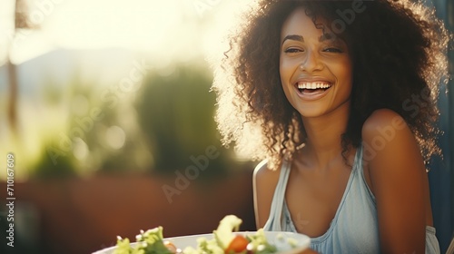 Woman smiling happy eating fresh salad food healthy lifestyle in outdoors beautiful day AI generated photo
