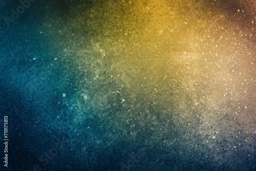 speckled texture with a gradient transition from golden yellow to deep blue.