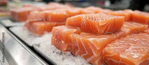 Frozen salmon or pink fish blocks in a zero waste shop, without packaging.