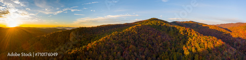 Aerial panorama of the Blue Ridge Mountains of North Carolina at sunrise in full autumn color