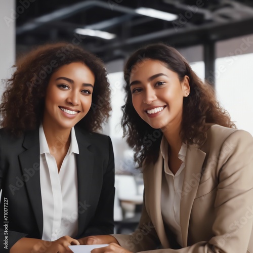 Happy multiethnic smiling business women working together in office.Ai generative