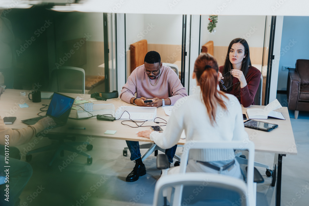 Obraz premium Multicultural business team working on a successful project at office.