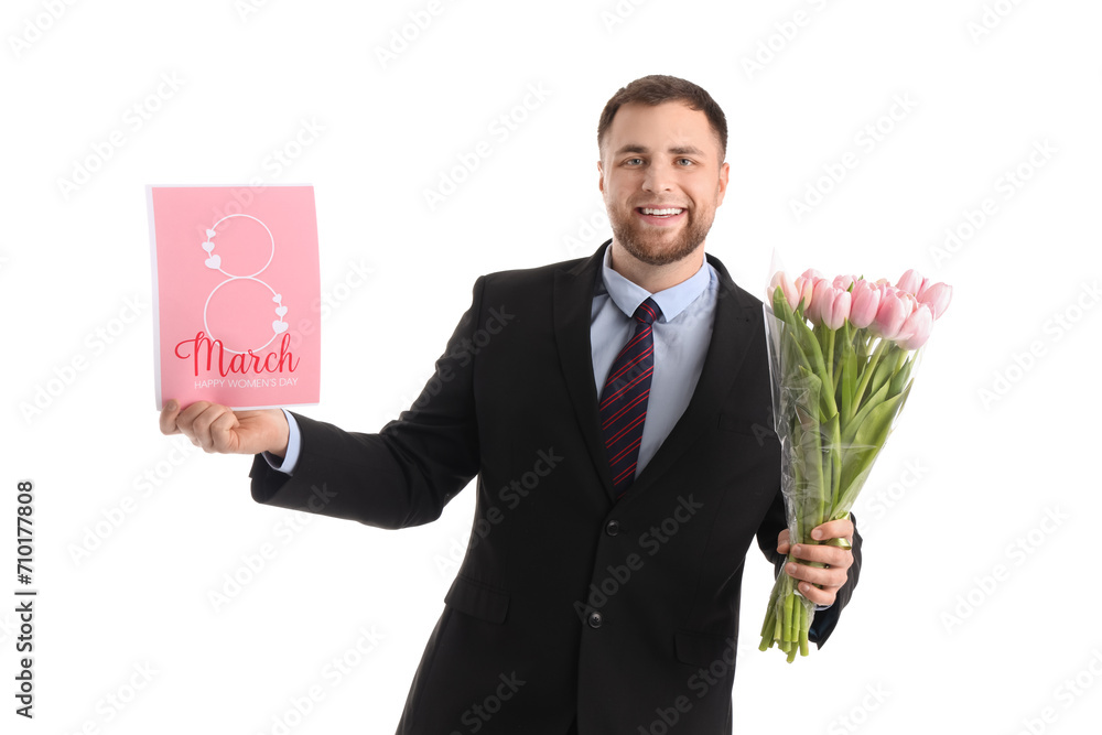 Handsome businessman with tulips and greeting card on white background. International Women's Day celebration Handsome businessman with tulips and greeting card on white background. International Women's Day celebration