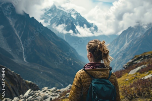 Wallpaper Mural Woman explores mountain range. Torontodigital.ca