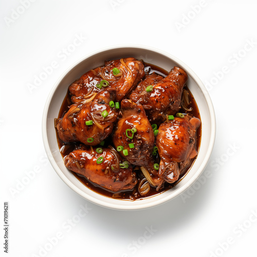 Chicken Adobo cooked in a flavorful sauce made with soy sauce, vinegar, garlic, and spices