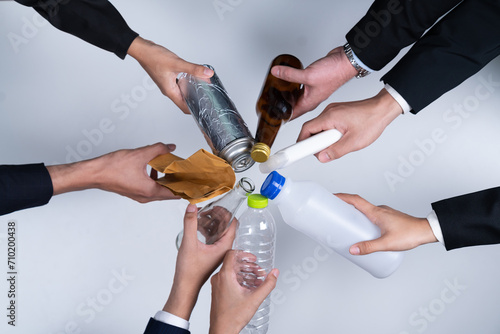 Top view hand holding garbage waste on isolated background. Eco-business recycle waste policy in corporate responsibility. Reuse  reduce and recycle for sustainability environment. Quaint