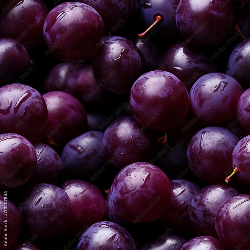 Fototapeta premium Fresh and juicy ripe acai berry isolated on a dark purple background high quality image