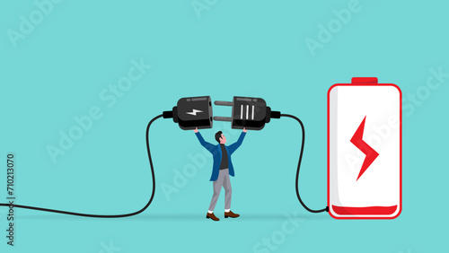 low battery, businessman low energy or tired, overworked or stressed at work, refresh or recover after tired at work, re charge yourself, businessman connect plug with low battery to power socket