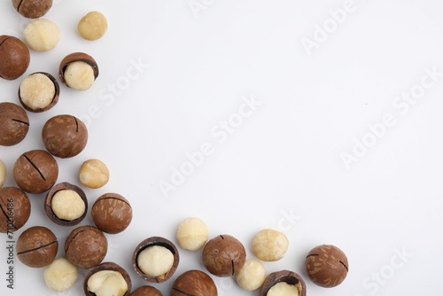 Wallpaper Mural Tasty Macadamia nuts on white background, flat lay. Space for text Torontodigital.ca