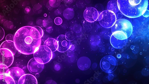 Abstract glowing purple and blue orbs on a dark background