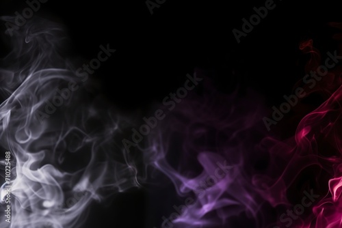 Abstract smoke background with colorful glow on dark background in ethereal aura. Contrast between the dark background and the mesmerizing luminosity of the smoke in a magical atmosphere. photo