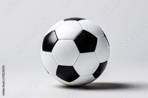 A white backdrop with a football
