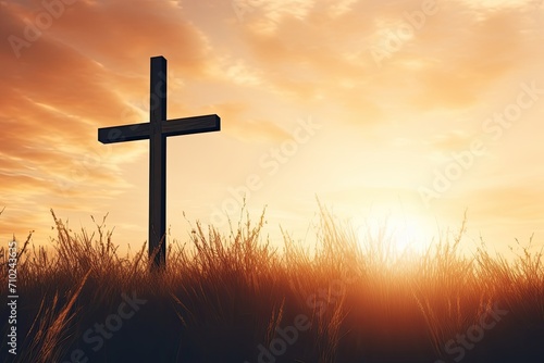 Silhouetted cross against autumn sunset backdrop on Easter © LimeSky
