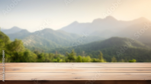 empty wood table top on blur background of mountain