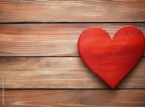 Red heart on a wooden background
