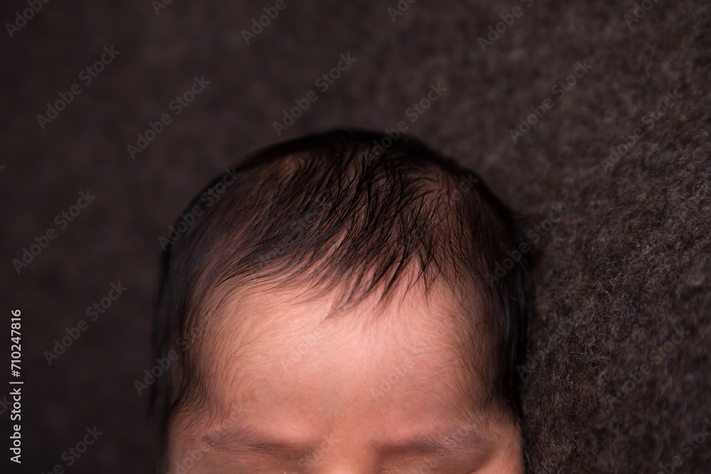 Top of newborn baby head with baby hair Top of newborn baby head with baby hair