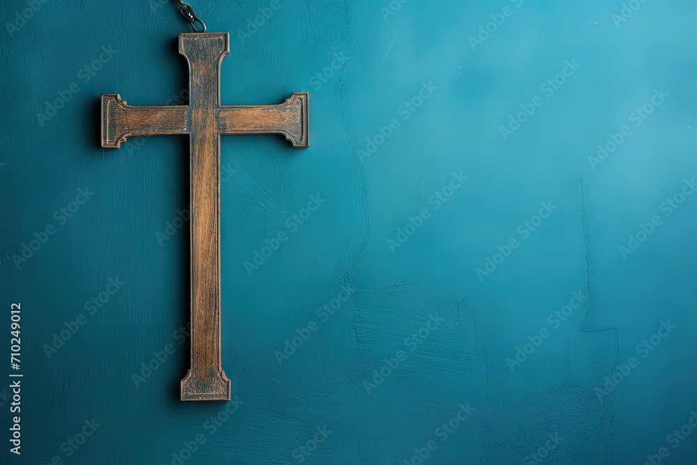 Wooden cross on blue background in a retro style image