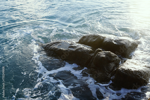 rocks in the sea exposed to the morning sun                               