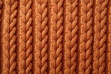 Closeup of patterned warm sweater made of knitted wool or cashmere texture on a background
