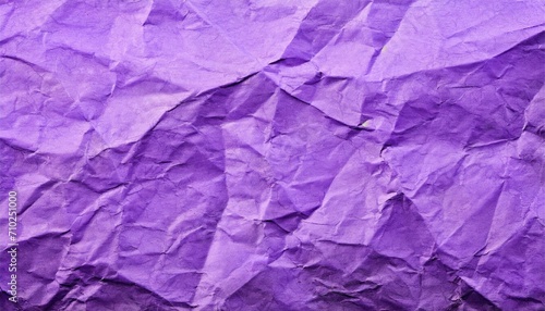 The purple crumpled paper background.