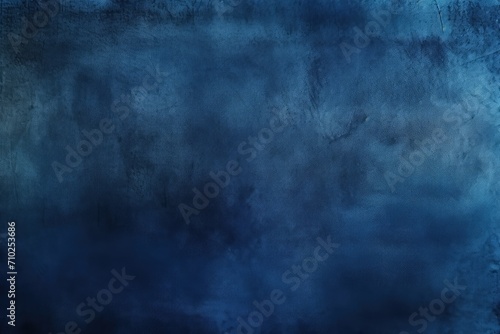 Grunge velvet textured navy blue backdrop Wide banner or wallpaper with space for text and design Uneven velvety photo background photo