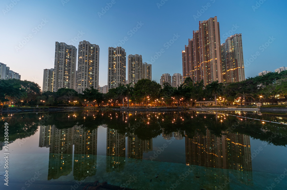 High rise residential building in Hong Kong city at dusk