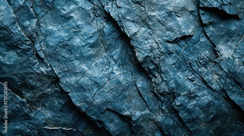 Rock texture background. dark blue rough mountain surface. textured stone background with space for design