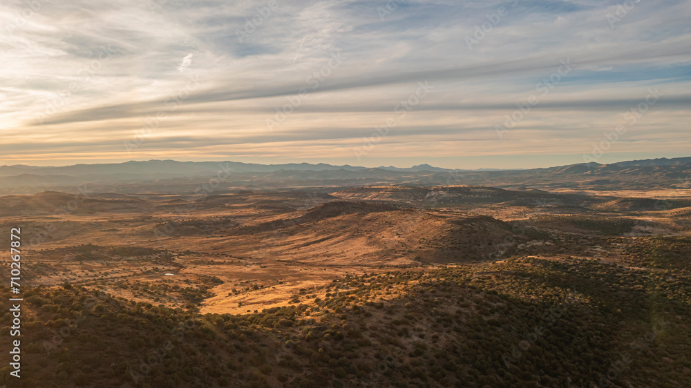 Aerial photo of a desert valley during sunset in Arizona