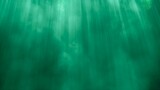 Abstract Green Underwater Scene with Light Rays and Particles