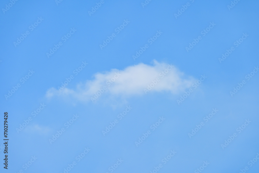 beautiful blue sky and white fluffy single cloud with sunrise in the morning, natural background beautiful blue sky and white fluffy single cloud with sunrise in the morning, natural background