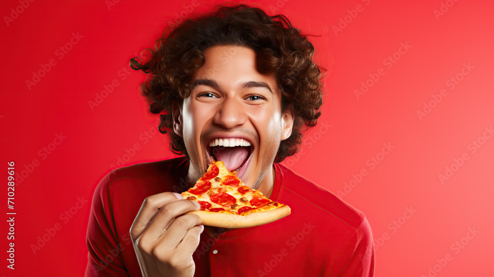 Happy male enjoying delicious pizza, laughter and fun Happy male enjoying delicious pizza, laughter and fun