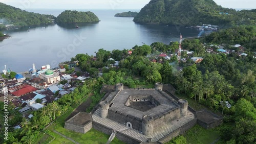 Orbital drone view of Banda Neira Fort and harbour bay photo